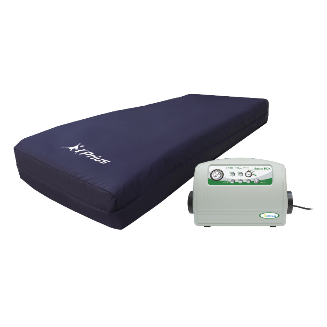 The Prius Salute RDX Alternating Pressure Mattress System is a dark blue medical mattress featuring Micro Low Air Loss Technology and a white Lipois logo. It includes a control unit with buttons, knobs, and a display screen to adjust settings for optimal comfort and support.